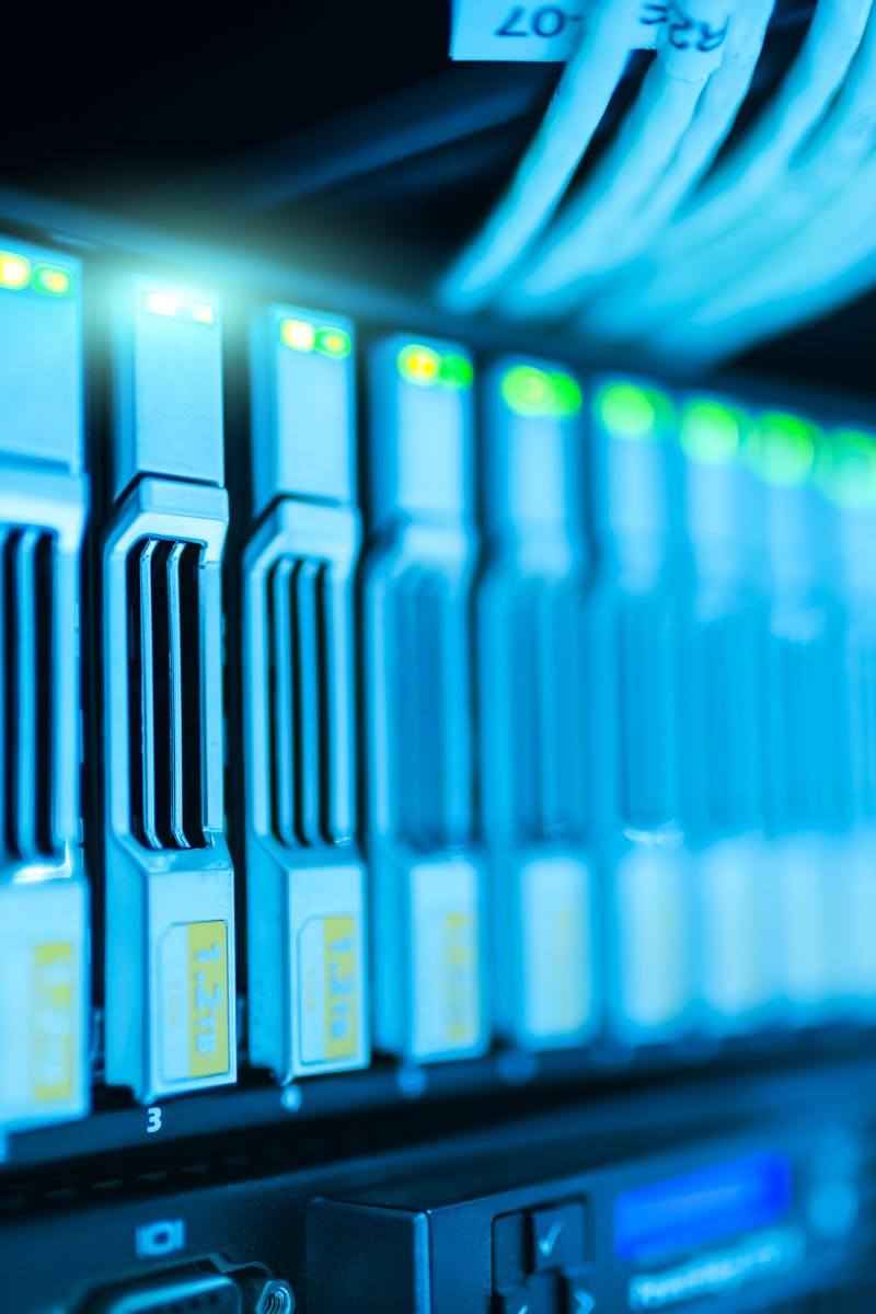 Detailed image of a server rack with glowing lights in a modern data center.